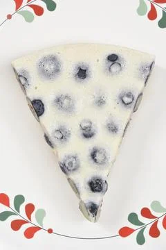 Top View of Blueberry Cake Slice on Patterned Plate Stock Photos