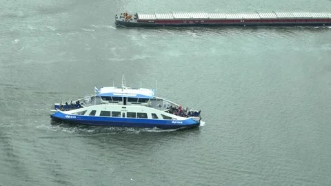 Top view of boat doing Amsterdam canal tour Stock Footage 252689755