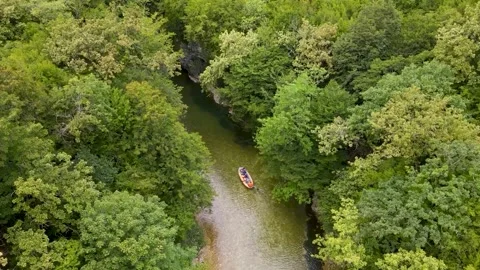 Top view boat sailing along River of the Martvili Canyon Georgia Stock Footage 168616957