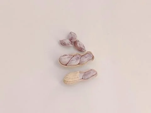 Top view of Boiled peanuts, both shelled and unshelled, on a white background Stock Photos