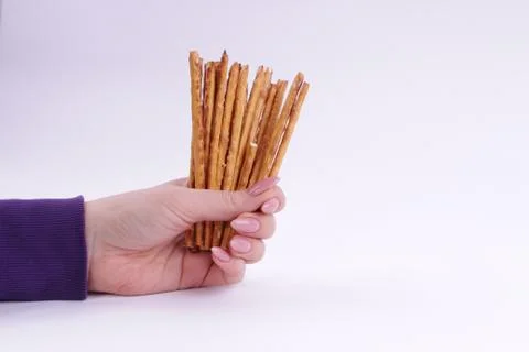 Top view of bread sticks in a hand Stock Photos