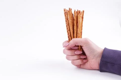 Top view of bread sticks in a hand Stock Photos