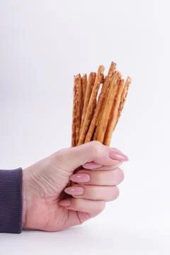 Top view of bread sticks in a hand Stockfoto's