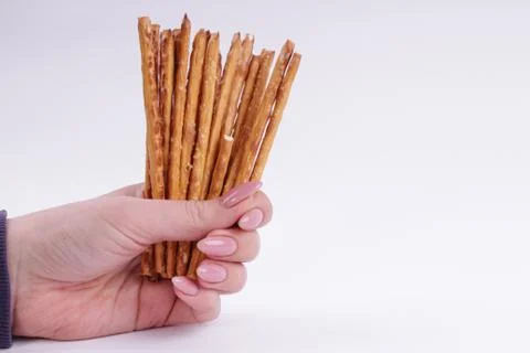Top view of bread sticks in a hand Stock Photos