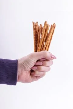 Top view of bread sticks in a hand Stockfoto's