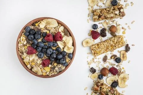 Top view breakfast cereal bars with fruits bowl. High quality and resolutio.. Stock Photos