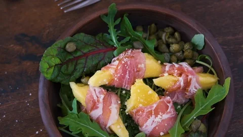 Top view of breakfast with poached egg and toast bread, salad with arugula Stock Footage 124796542