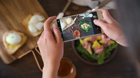 Top view of breakfast with poached egg and toast bread, salad with arugula Stock Footage 126485757