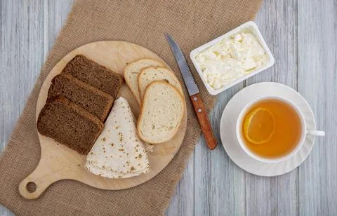 Top view of breakfast set with breads as sliced rye white ones and flatbrea.. Stock Photos