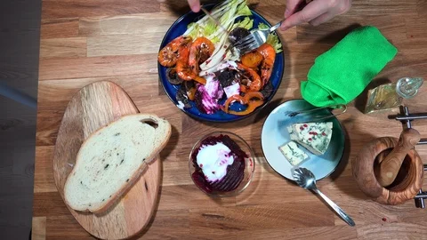 Top view with breakfast, tea, egg, salad and smartphone. 库存影片 87706140