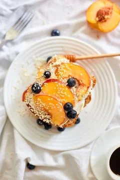Top view Breakfast on white bed sheets, good morning, summer french toast Stock Photos