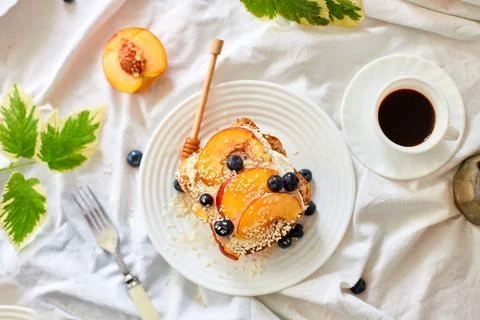 Top view Breakfast on white bed sheets, good morning, summer french toast Stock Photos