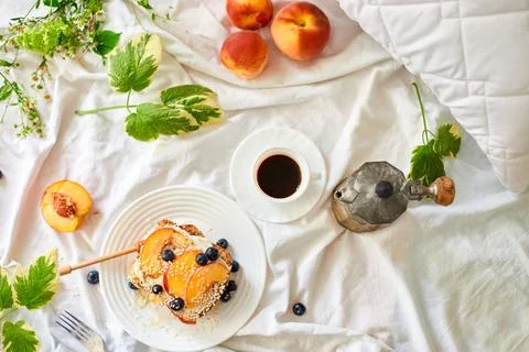 Top view Breakfast on white bed sheets, good morning, summer french toast Stock Photos