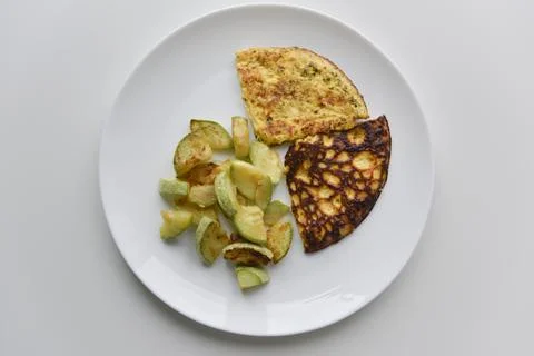 Top view at the breakfast on the white plate Stock Photos