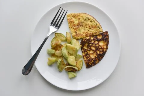 Top view at the breakfast on the white plate Stock Photos