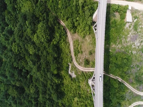 Top view of bridge across the river in the mountains Stock Footage 80249058