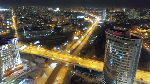 Top view of bridge highway with yellow light near night city 4K. Cross road Stock Footage 101055108