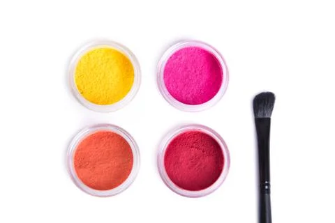 Top view of bright eye shadows and makeup brush Foto stock