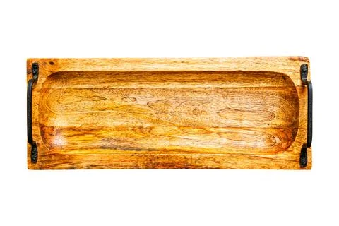 Top view brown rectangular wooden tray with black metal handles. Stock Photos