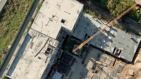 Top View Of Building Construction Site, Tower Crane And Concrete Roof Slabs Stock Footage 317249591