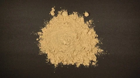 TOP VIEW: Building of pile of ginger powder - Stop motion animation Stock Footage 121943168