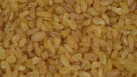 Top view of bulgur wheat rotating. Closeup. Macro. Stock Footage 170642415