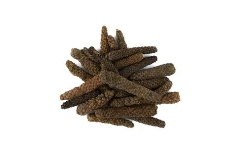 Top view of bunch of Long or Pippali pepper fruits on white background. Stock Photos