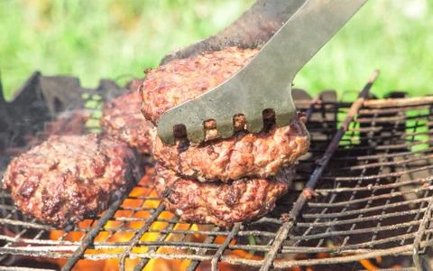 Top view of burger chops preparing on grill Stock-Fotos