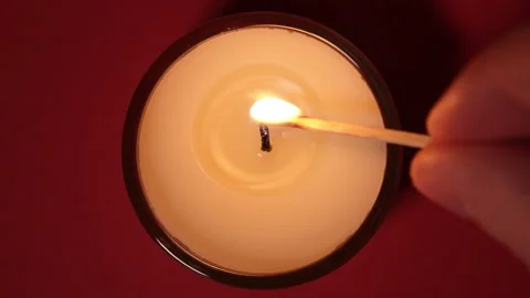 Top view on Burning candle close up on a dark background. Slow motion full HD Stock Footage 159567533