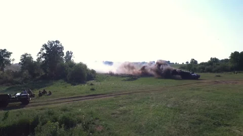 Top view burning German tank with black smoke. Shot from drone. Victory in war Stock Footage 101068172