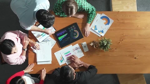 Top view of business man using tablet display increasing graph. Convocation. Stock Footage 273251650