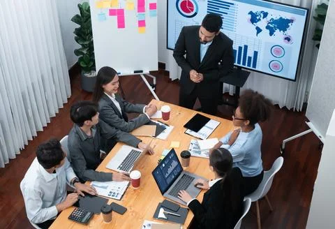 Top view business presentation with data analysis dashboard on TV. Concord Stock Photos