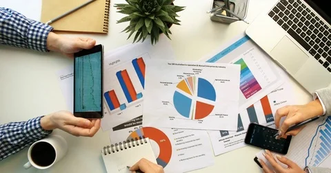 Top view of business team working together at office desk and checking a Stock Footage 74691318