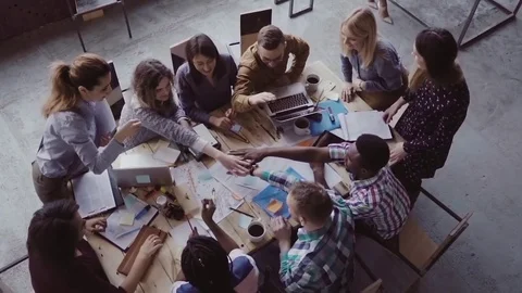 Top view of business team working at office. Young mixed race group of people Stock Footage