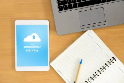 Top view of business workspace to cloud Uploading , notebook and female han.. Fotos Stock