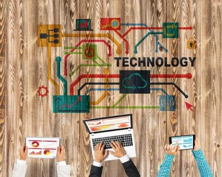 Top view of businesspeople sitting at table and using gadgets Stock Photos