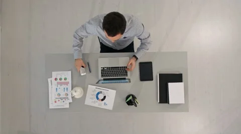 Top view of Busnessman is using his smartphone to take a selfie Stock Footage 58172730