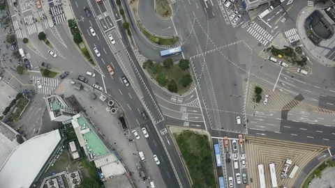 Top view of busy intersection with many vehicles and various architecture, Seoul Stock Footage 126613689