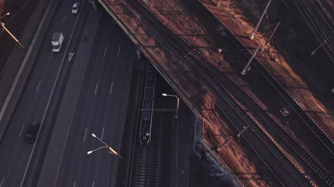 Top view of a busy road and railway tracks. Stock Footage 165878776
