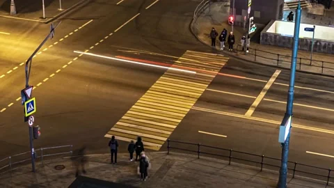 Top view of a busy square with crowds, crosswalks and heavy traffic, time lap Stock Footage 143433798