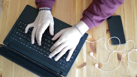 Top view busy worker typing on his laptop on his desk. laptop typing top Video stock 186068546