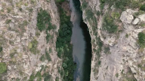 Top view of a calm river in the gorge Stock Footage 240541747