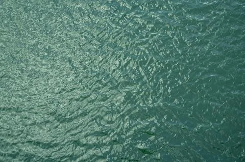 Top view of calm water surface texture with soft natural ripples. Backgroun.. Stock-Fotos