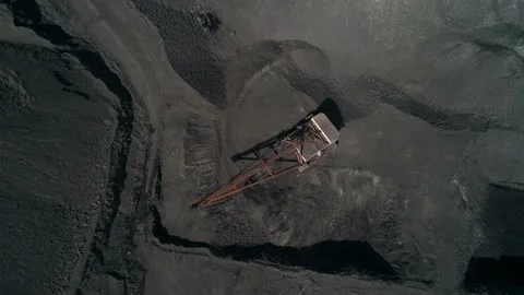 Top view, camera fly over working walking excavator in quarry of Kusbass coal Stock Footage 203918842