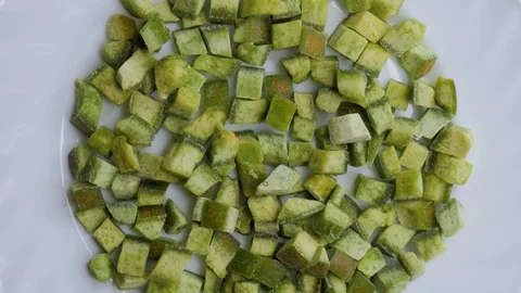 Top view candied fruit pomelo are rotating in a plate Stock Footage 105145894