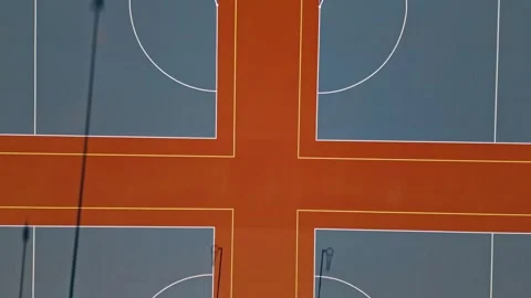 Top view capture by a drone of netball courts. The aerial perspective highlights Stock Footage 331268441