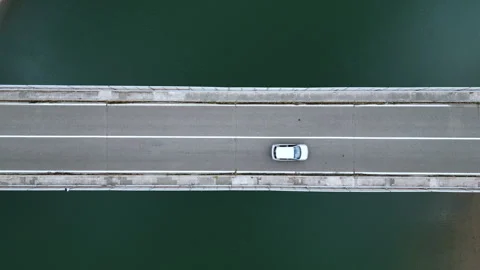 Top view of a car crossing a bridge Stock Footage 244000622