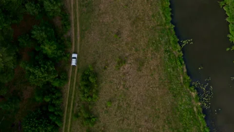 Top view of the car driving along the river bank Stock Footage 166267201