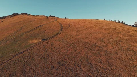 Top view of a car driving on mountain slope Stock Footage 93220564
