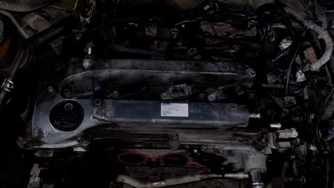 Top view of car engine valve cover with ignition coils. Stock Footage 338364494